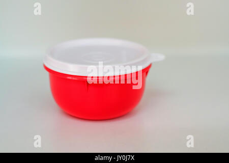 Modern red food container with lid isolated Stock Photo