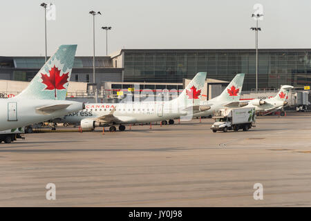 Air Canada commercial planes on the tarmac of Montreal Pierre Elliott Trudeau International Airport Stock Photo