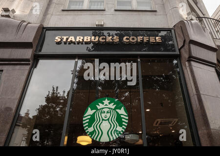 BUDAPEST, HUNGARY - AUGUST 11, 2017: Starbucks logo in front of a Starbucks coffeehouse in the city center of Budapest, capital city of Hungary  Pictu Stock Photo