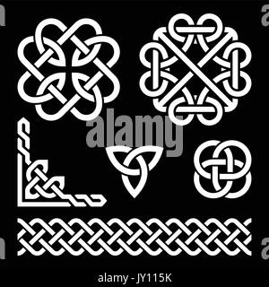 Celtic Irish knots, braids and patterns in white on black background    Vector set of traditional Celtic symbols, knots - monochorme Stock Vector