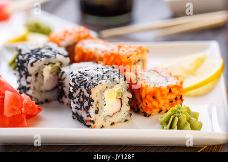 Sushi rolls, nigiri, maki, pickled ginger, wasabi. Stock Photo