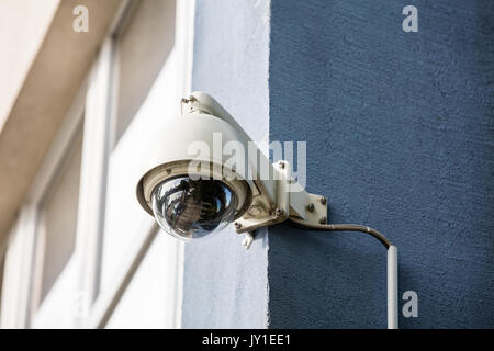 Close-up Of Security Camera Installed On The Wall Of The Building Stock Photo