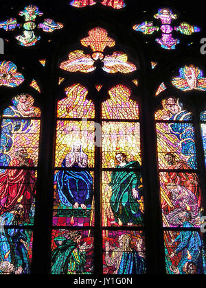 Twentieth century stained glass window in the nave of Chrám sv Víta, Prague Stock Photo