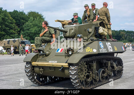 Free French M3A3 Stuart tank during WW2 military vehicles parade at Wold War Two militaria fair Stock Photo