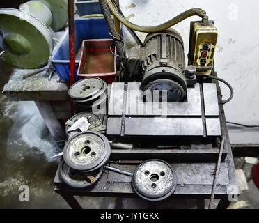 Old dirty obsolete but still functional motor Stock Photo