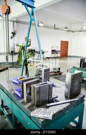 Set of heavy press forms on table Stock Photo