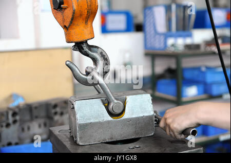 Working with press form at CNC workshop Stock Photo