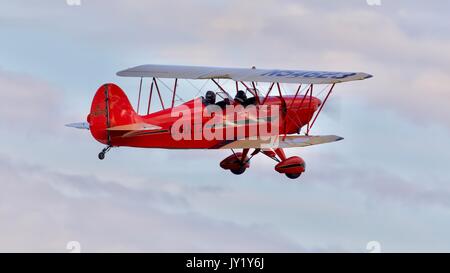 Hatz CB-1 biplane taking off from Old Warden Aerodrome Stock Photo