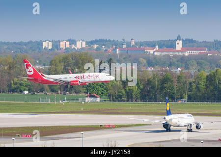 Munich, Germany - May 6, 2016: Airplane Boeing 737 of Air Berlin airline landing in Munich international airport. Stock Photo