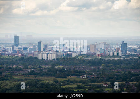 A view of Manchester City Centre from the vantage point of Hartshead Pike, Mossley, in Saddleworth, UK Stock Photo