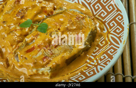 Bengali mustard fish Curry.  Fish cooked with masala in mustard oil tastes. Stock Photo