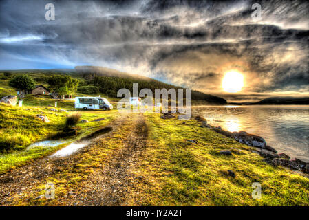 Area of Altnaharra, Scotland. Picturesque misty sunrise view of the Caravan and Motorhome Club site at Grummore near Altnaharra. Stock Photo