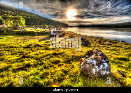 Area of Altnaharra, Scotland. Picturesque misty sunrise view of the Caravan and Motorhome Club site at Grummore near Altnaharra. Stock Photo