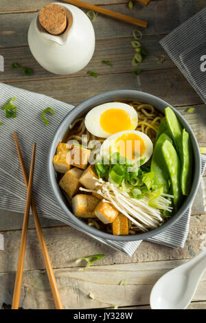 Homemade Japanese Vegan Tofu Ramen Noodles with Egg and Mushrooms Stock Photo