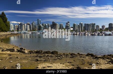 Vancouver Downtown City Center Skyline, Boats Marina Scenic Landscape View from Stanley Park Seawall Beach on a Sunny Day in British Columbia Canada Stock Photo