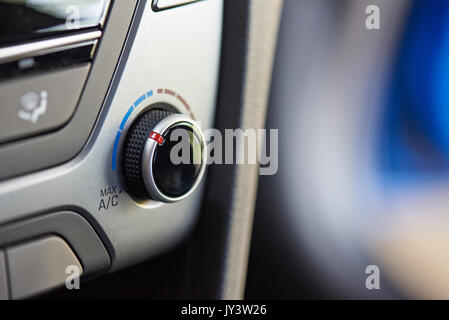 Macro of air conditioner  knob in modern car interior Stock Photo