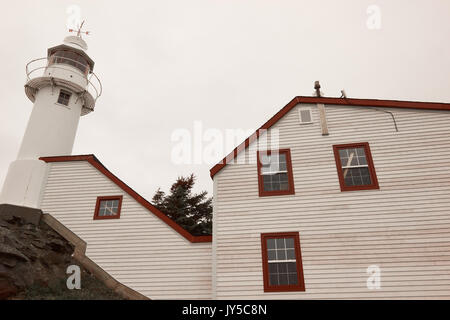 Lobster Cove Head Lighthouse, (1897-1901), Rocky Harbour, Gros Morne National Park (a UNESCO world heritage site), Newfoundland, Canada Stock Photo