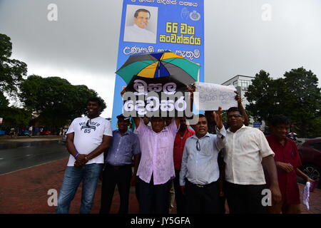 Opposition activists loyal to former president Mahinda Rajapakse protest against government plans to involve foreign companies to manage loss-making state enterprises in the capital Colombo on August 18, 2017. The rally was organised to coincide with the second anniversary of the government of Maithripala Sirisena. Stock Photo