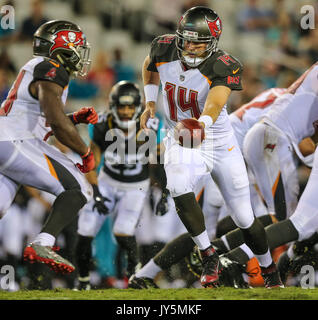 August 24, 2017: Jacksonville Jaguars wide receiver Justin Blackmon (14)  escapes Carolina Panthers cornerback Cole Luke (32) during a punt return in  the second half of an NFL preseason game in Jacksonville