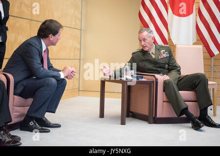 Tokyo, Japan. 18th Aug, 2017. U.S. Chairman of the Joint Chiefs Gen. Joseph Dunford, right, speaks with the US. Ambassador to Japan William Hagerty, left, before a meeting with Japanese Prime Minister Shinzo Abe, at the Kantei Official Residence August 18, 2017 in Tokyo, Japan. Dunford is in Japan to meet with Japanese leaders and to discuss defusing the situation in North Korea. Credit: Planetpix/Alamy Live News Stock Photo