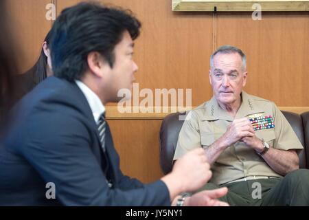 Tokyo, Japan. 18th Aug, 2017. U.S. Chairman of the Joint Chiefs Gen. Joseph Dunford during a bilateral meeting with Japanese Defence Minister Tomohiro Yamamoto, left, at the Ministry of Defense August 18, 2017 in Tokyo, Japan. Dunford is in Japan to meet with Japanese leaders and to discuss defusing the situation in North Korea. Credit: Planetpix/Alamy Live News Stock Photo