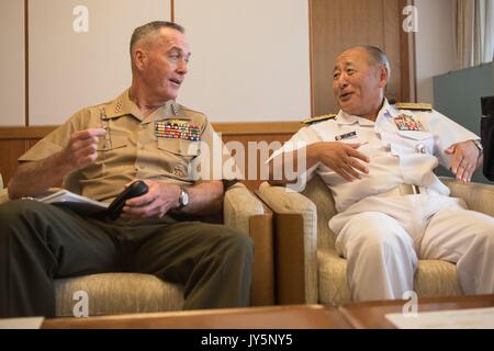 Tokyo, Japan. 18th Aug, 2017. U.S. Chairman of the Joint Chiefs Gen. Joseph Dunford, left, meets with Japanese Chief of Staff of the Self-Defense Force Adm. Katsutoshi Kawano, at the Ministry of Defense August 18, 2017 in Tokyo, Japan. Dunford is in Japan to meet with Japanese leaders and to discuss defusing the situation in North Korea. Credit: Planetpix/Alamy Live News Stock Photo