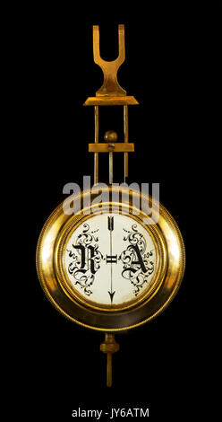 the pendulum wall clock. The end of the 19th century. Isolated on a black background Stock Photo