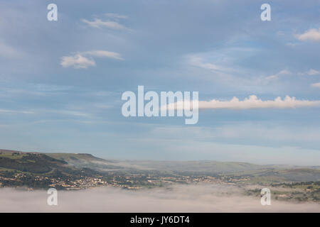 Misty Morning Landscape over the Aire Valley, overlooking Silsden and Steeton and Keighley from Addingham Moorside Stock Photo