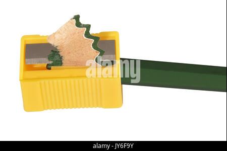 Close up of green colored pencil and pencil sharpener Stock Photo