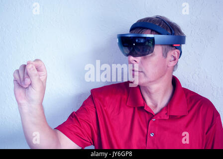 engineer working with smart glasses creating virtual reality Stock Photo