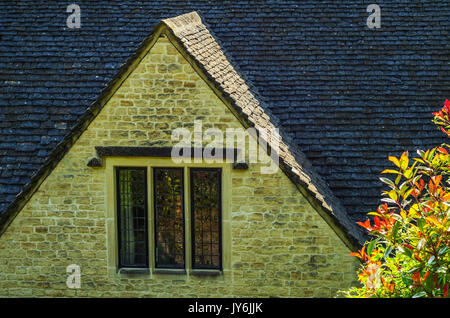 Roofs of buildings covered with sar roof tile, beautiful English architecture, old roofs, vintage Stock Photo