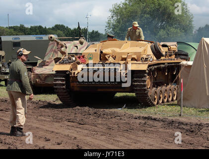 A beautifully restored Stug III armoured vehicle being manoeuvered ...