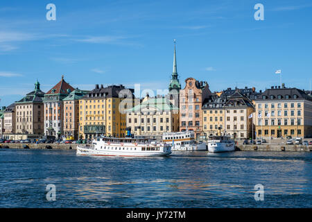 View towards historic Old Town from Skeppsholmen bridge  in Stockholm. The capital city of Sweden is built on 17 islands. Stock Photo