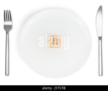 Single sushi roll in middle of white plate with fork and knife isolated on white background. Food and nutrition concept. Stock Photo
