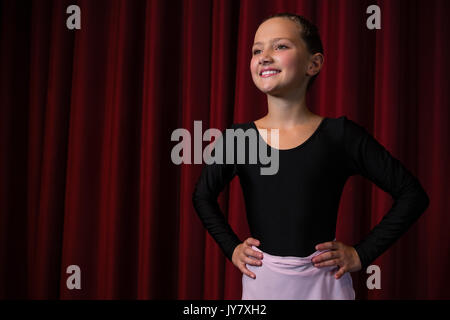Ballerina practicing ballet dance in the stage Stock Photo