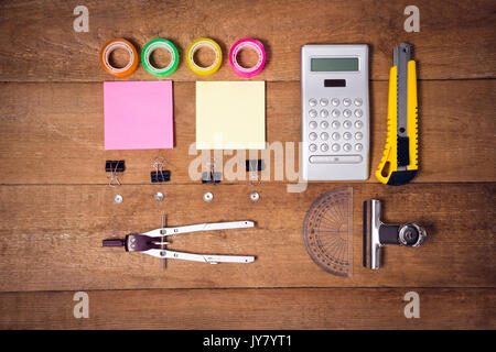 Directly above of shot of instruments on wooden table Stock Photo