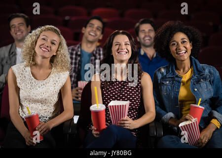 Group of people watching movie in theatre Stock Photo