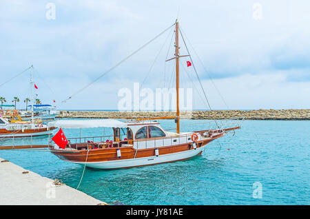 The sail yacht in tourist port of Side, the popular Turkish resort on Mediterranean sea. Stock Photo