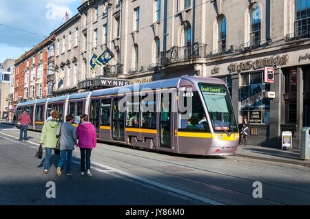 A Luas tram passes Wynns Hotel in Ireland's capital city Dublin Stock Photo