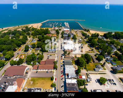 Aerial view of Lexington Michigan on Lake Huron showing a man made harbor and how it protects a marina from wind and waves Stock Photo