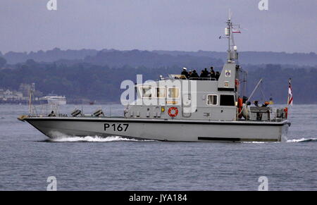 AJAXNETPHOTO. 16TH AUGUST, 2017. PORTSMOUTH, ENGLAND. - TRAINING SHIP  - P2000 CLASS HMS EXPLOIT OUTWARD BOUND AT SUNSRISE TO RENDEZVOUS WITH NEW AIRCRAFT CARRIER HMS QUEEN ELIZABETH.  PHOTO:JONATHAN EASTLAND/AJAX REF:D171608 6750 Stock Photo