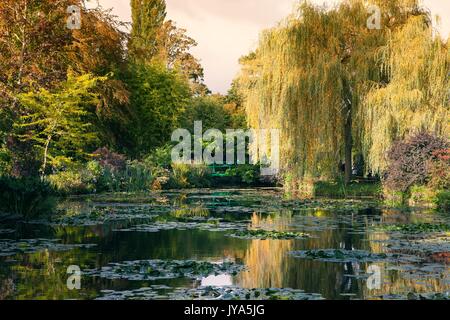 Claude Monet the garden in autumn, water lilies in the lake on a Sunny day, Giverny, France Stock Photo