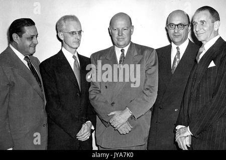 Norman K, American television host Lynn Poole, Dr Allen B DuMont, executive Ben Cohen, and magazine editor Edward Weeks are standing left to right for a group portrait, 1950. Stock Photo
