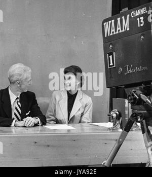 American television host Lynn Poole (left) and Ranice Birch Davis (right), educator and medical illustrator based in Baltimore, on set for the Johns Hopkins Science Review television program, 1951. Stock Photo