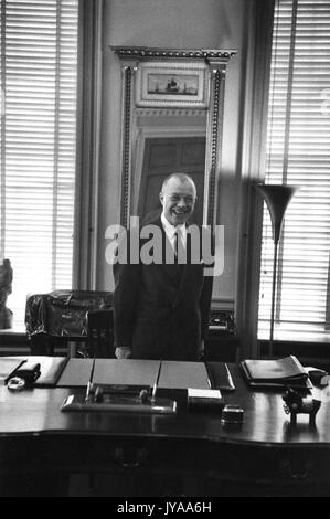 Milton Stover Eisenhower, president of Johns Hopkins University, in his office, 1957. Stock Photo