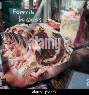 Aged Forerib steak in a Butcher shop in Borough Market. London, 2017. Squared format. Stock Photo