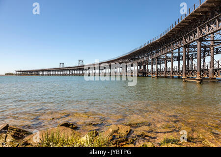 Old ironwork quay - Muelle del Tinto - at the river Rio Tinto in the city of Huelva. Andalusia, Spain Stock Photo