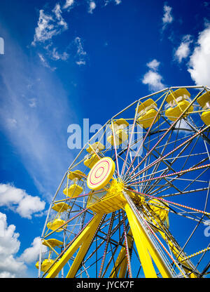 The yellow ferris wheel at the PotashCorp Playland at Kinsmen Park in Saskatoon, Saskatchewan, Canada. Stock Photo