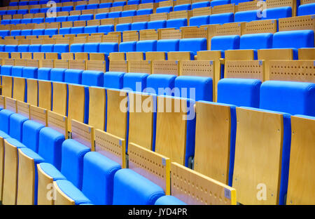 Empty blue seats at the hall Stock Photo
