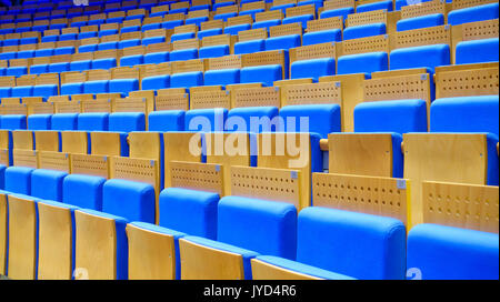 Empty blue seats at the hall Stock Photo